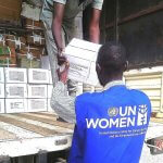 UN Women staff load humanitarian supplies to be distributed to women in Sudan. Photo: Muna Elsadaty.